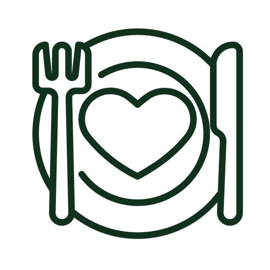 Plate, knife and fork with a heart in the middle symbolizing healthy food.
