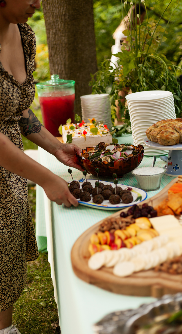 The Conscious Farm Kitchen catering spread for a buffet style picnic in the park.
